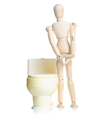 Wooden man with toilet on white background isolation. Concept of the problem with digestion.