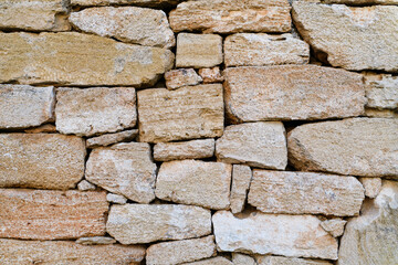 Old castle stone wall as texture or background for photo and graphic design