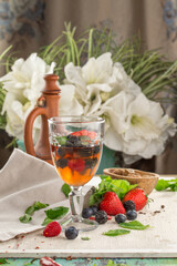 fresh Berry lemonade in wine glass on the table