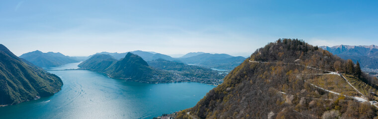 Fototapeta na wymiar Aerial view of Lugano lake, Lugano city and Monte Brè in Canton Ticino in southern Switzerland