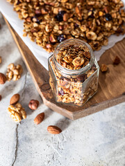 Homemade muesli with oats, nuts and seeds close up. Healthy breakfast concept.