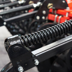 Damping springs of a modern cultivator.