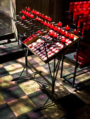 Lit prayer candles in a church