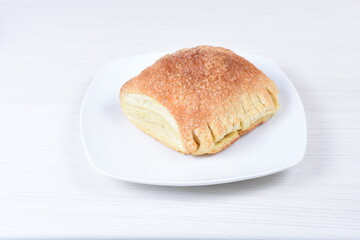 Guava puff pastry, on white wooden backgroun