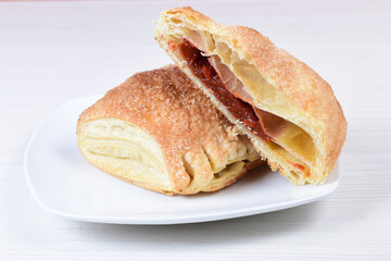 Puff pastry guava cake, on white wooden background