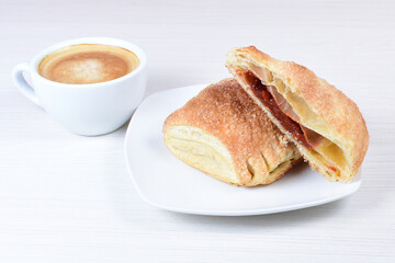 Puff pastry guava cake, on white wooden background