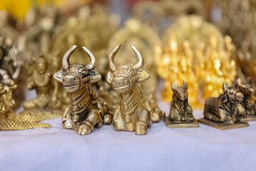 Brass products of Indian god  in Indian souvenir store.