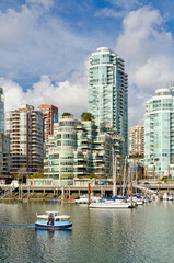 Fototapeta na wymiar Beautiful view at sunny harbor in downtown of Vancouver, Canada.