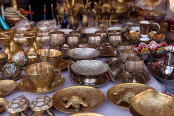 Brass designer lock products in Indian souvenir store.
