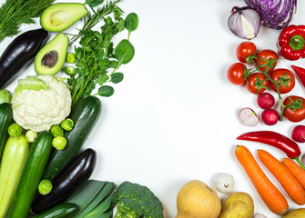 Various vegetables on a white background. Harvest. Zucchini, cabbage, onions, potatoes, tomatoes, carrots, cucumbers, beans, greens, peppers 