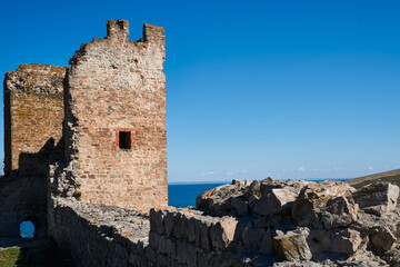 Ancient Genoese fort. The loophole of the old fort.