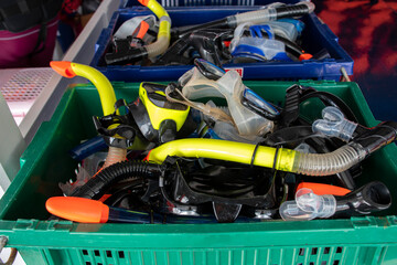 Fototapeta premium Colorful snorkel mask in plastic crate.