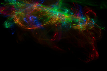 Abstract colorful blurred background on black