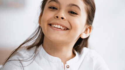 cute Brunette preteen girl at light room 