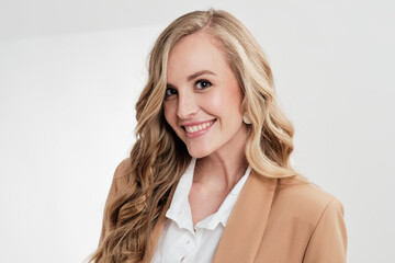 Fototapeta premium Executive pretty blonde woman portrait on a white background