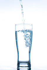 Pour water into a glass