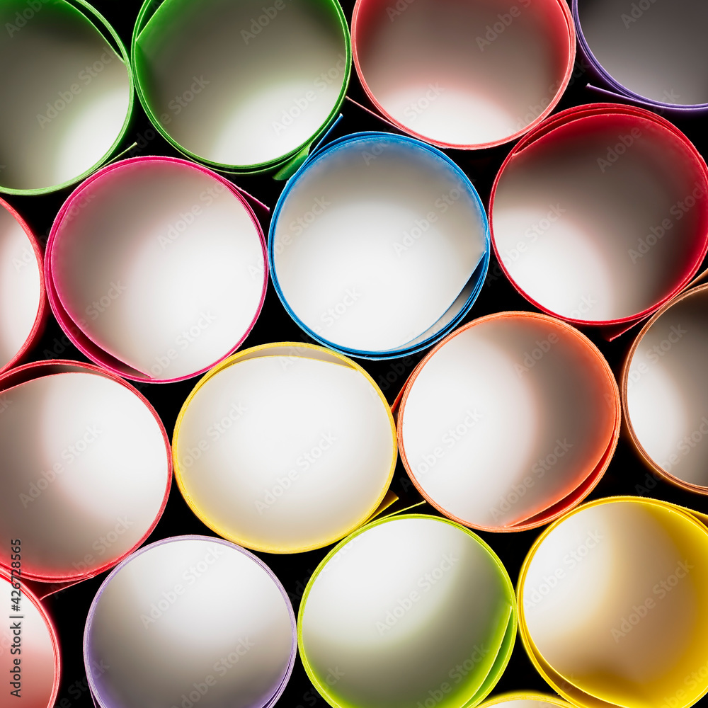 Wall mural abstract top view of rolled color paper sheets