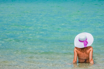 happy girl at sea in greece on sand nature