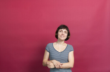 Obraz premium Russian girl in dress on pink background