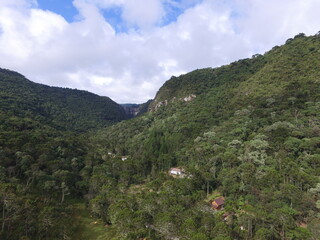 Fototapeta premium valley with a waterfall in the end