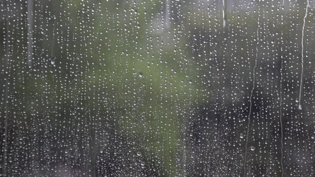 Fall Rain Through Wet Window With Raindrops