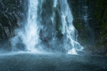 Stirling Falls plunging vertically into Milford Sound, New Zealand