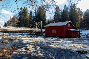 Long exposure photo. Old mill on the river Jokelanjoki, Kouvola, Finland