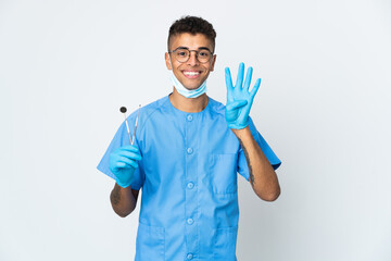 Brazilian dentist holding tool isolated on white background happy and counting four with fingers