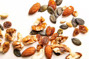 Various nuts on the white background. Selective focus, Top view.
