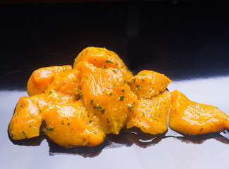 Raw chicken meat with marinade prepared for Moorish skewers