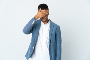 Young business Brazilian man isolated on white background covering eyes by hands. Do not want to see something