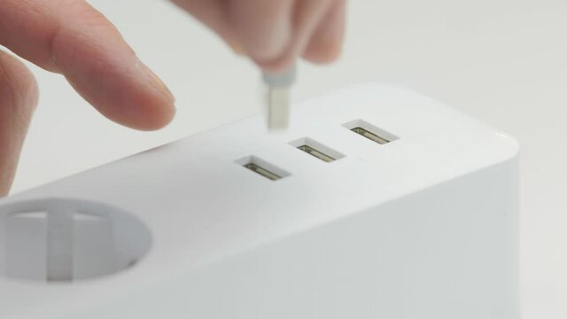 Connect a USB cable to a modern extension cable with sockets and USB connectors.