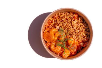 Eating diet concept. Buddha Poke Bowl Of Shrimp, Rice, Dry Onion. Lunch break. Close up, copy space, top view. Isolated on white background