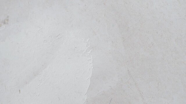 Vintage or grungy white background of natural cement or stone old texture as a retro pattern wall. It is a concept wall banner, grunge, material, aged construction with space for text. Video footage