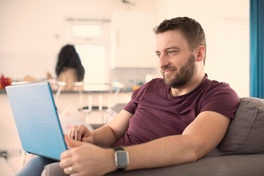 Man working from home at laptop