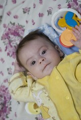 child with yelow dress