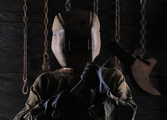 halloween man in old welding mask