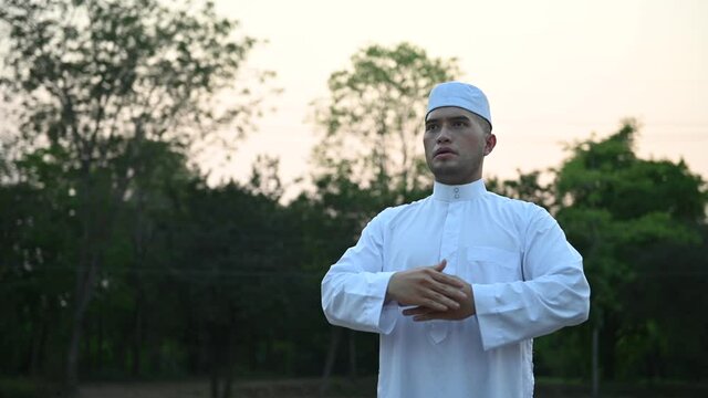 Asian white islam man prayer,Young Muslim praying,Ramadan festival concept