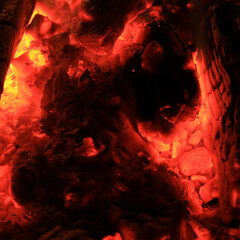 Burning and flaming briquettes from hot coal, close-up. Hot coals in the oven.
