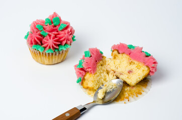 Broken cupcake isolated in white background