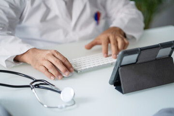 Close up of a Doctor working and having a video conference with a patient
