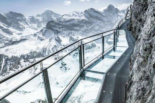 Glass floor on a thrill walk on the top of Birg, Switzerland