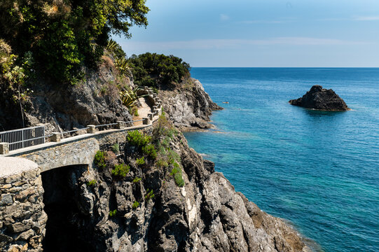 Monterosso, Liguria, Italy, June 2020. La via dell'amore panoramic path that connects the Cinque Terre: an amazing corner of coast with crystal clear waters and wild nature. Beautiful summer day.