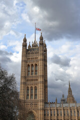 Fototapeta na wymiar Parliament of the United Kingdom with flag at half mast, national mourning