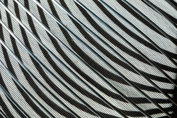 harmonic shadow of a silver chair in detail