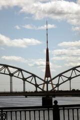 Railway Bridge over Daugava River in Riga, Latvia on a cloudy day..