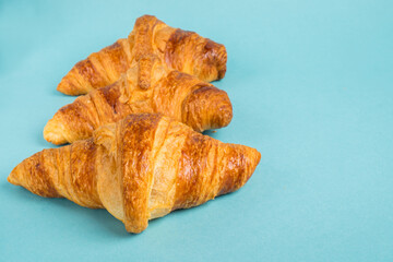 Continental breakfast with gold french croissants and cup of tea