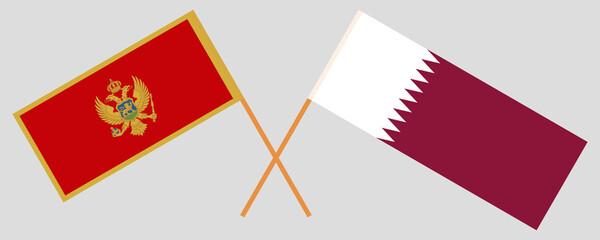 Crossed flags of Montenegro and Qatar. Official colors. Correct proportion