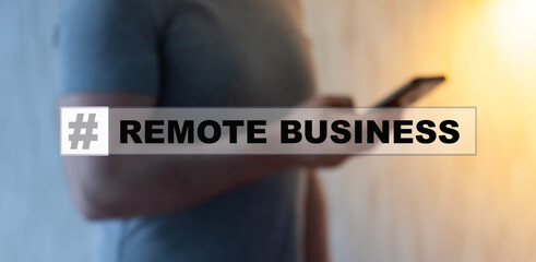 A novice businessman is studying a business topic on a smartphone - REMOTE BUSINESS