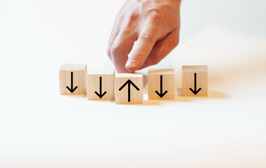 The person chooses the upward movement, together with the downward movement. Business line concept.
